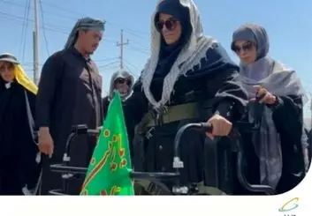 حضور بانوی ضایعه نخاعی در راهپیمایی اربعین با کمک یک ربات و حمایت همراه اول